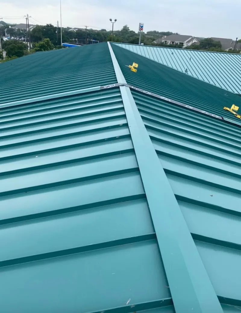 Green commercial metal roof ridge and valley for Metal Roof Repair in New Hyde Park